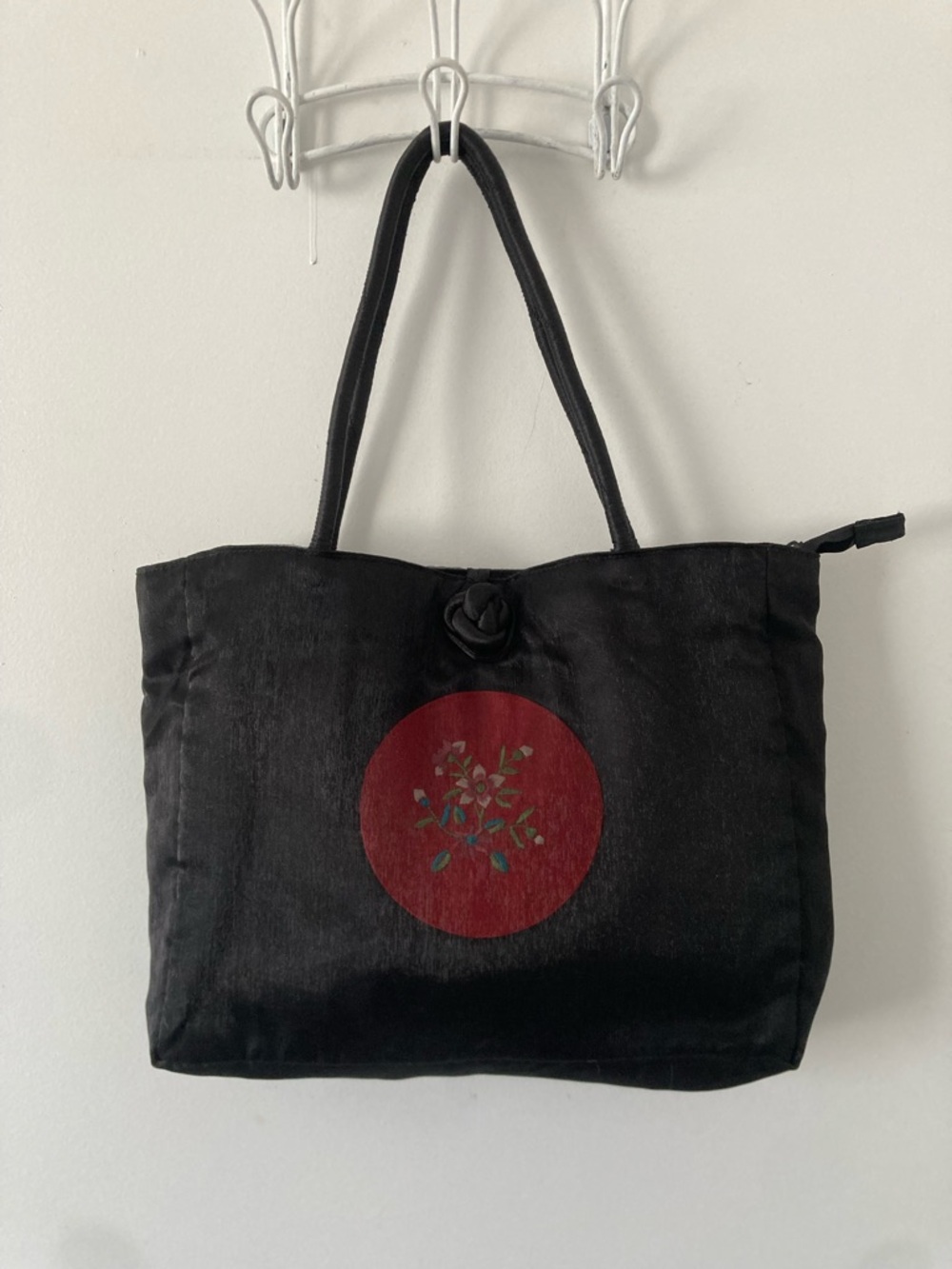 Newport News Black Tote with Red Floral Medallion